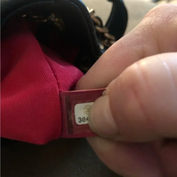 CHANEL Black Quilted Shoulder Bag with Gold Accents